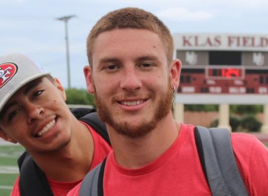 Photo of Caleb Lueders, right, at Klas Field