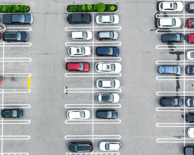 Overhead shot of cars in parking lot