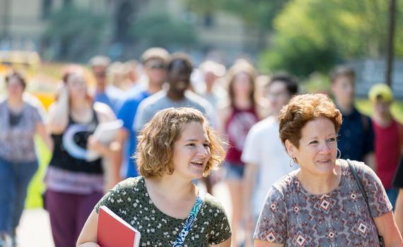 A photo of first-year students visiting campus with their parents 