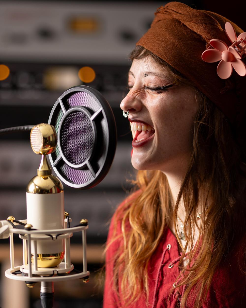 Student singing into microphone